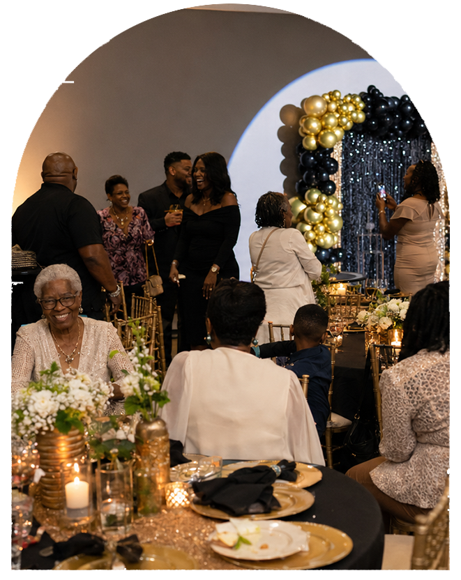 Guests at a black-and-gold party.