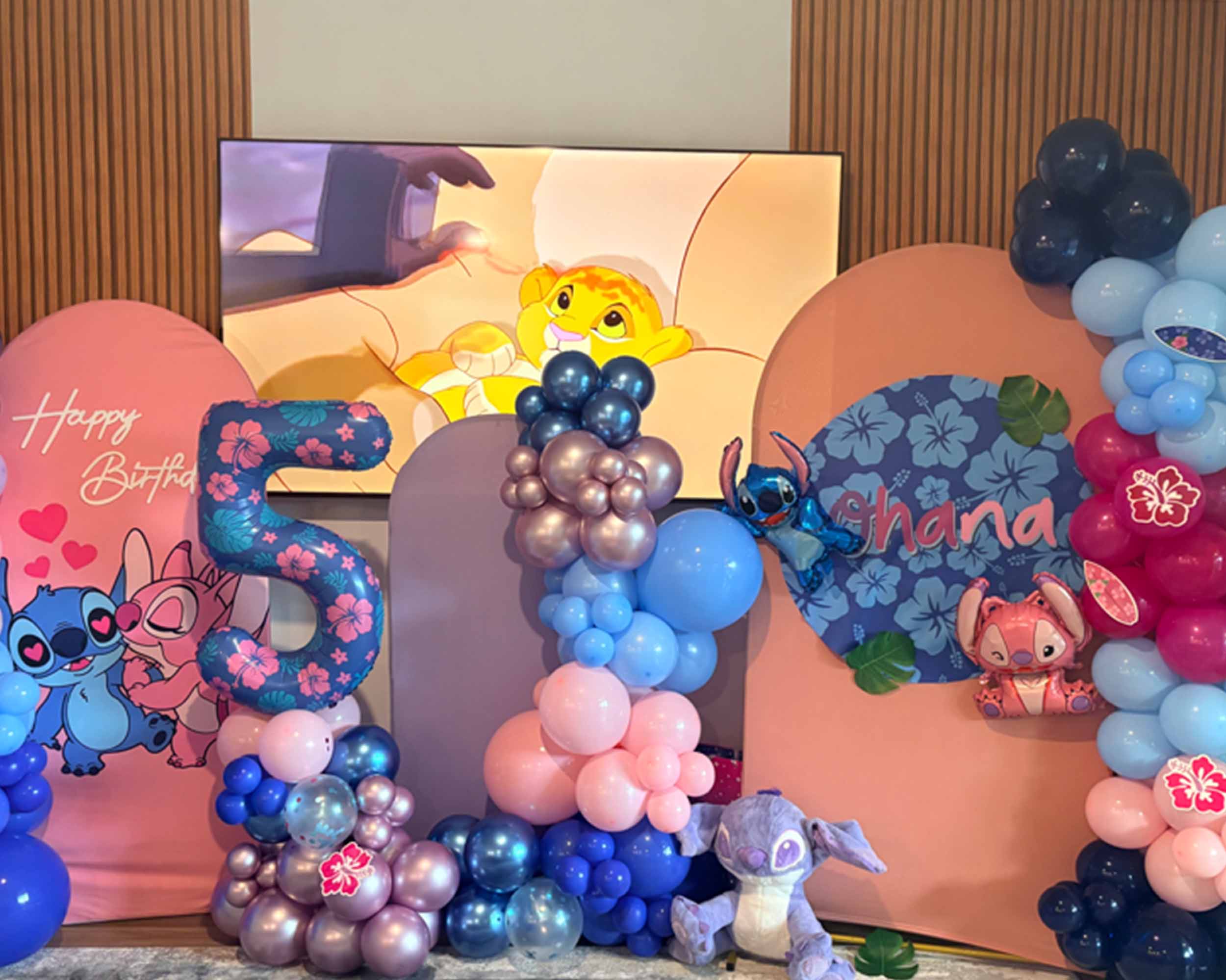 A festive birthday party scene featuring colorful balloons and cheerful decorations